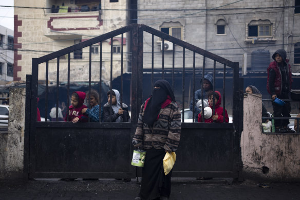 Palestinians line up for a meal in Rafah, Gaza Strip.