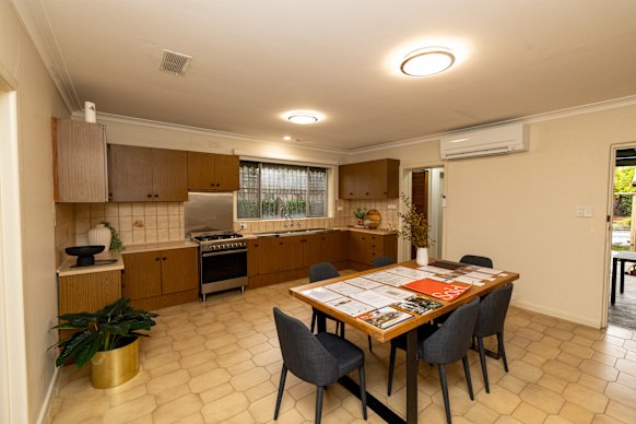 The house has tiled floors, a lemon tree and even chicken coops.