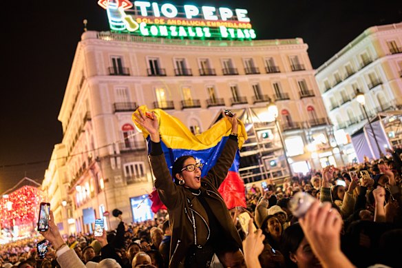 Venezuelans celebrate in Madrid after the capture of President Nicolas Maduro by the US.