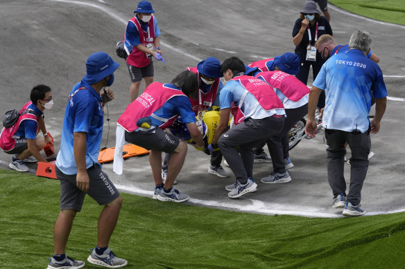 Saya Sakakibara of Australia is stretchered away by medics after crashing in the women’s BMX racing semifinals at the Tokyo Olympics.