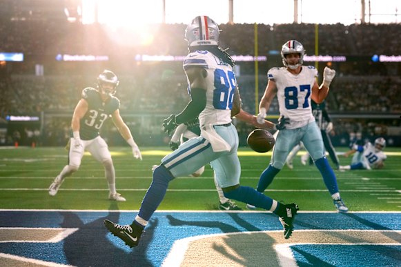 The sun streams in from the western end of AT&T Stadium during a clash between the Dallas Cowboys and Philadelphia Eagles.