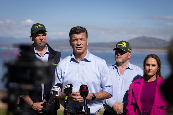 Angus Taylor (second from left) in the federal electorate of Farrer on Monday.