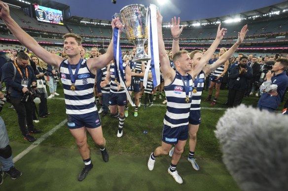 Tom Hawkins and Joel Selwood take a victory lap.