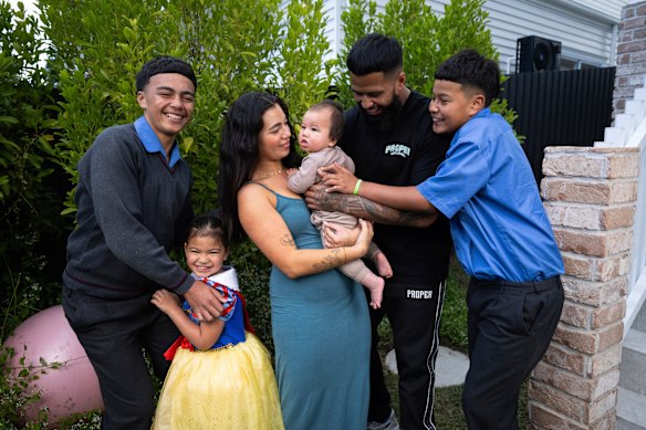 Family first for South Sydney-bound Payne Haas. Pictured last year with his younger brothers Hans (left) and Geejay, partner Leilani Mohenoa and their children Lalita and Luckee at their home in Brisbane.
