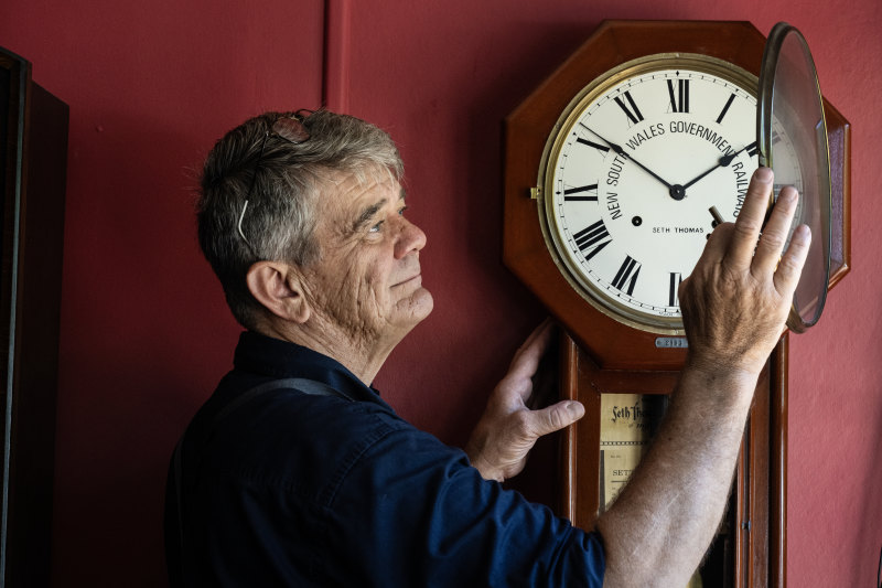 Time keeper: horologist Andrew Markerink with a NSW Railways Seth Thomas drop dial clock that he is restoring.