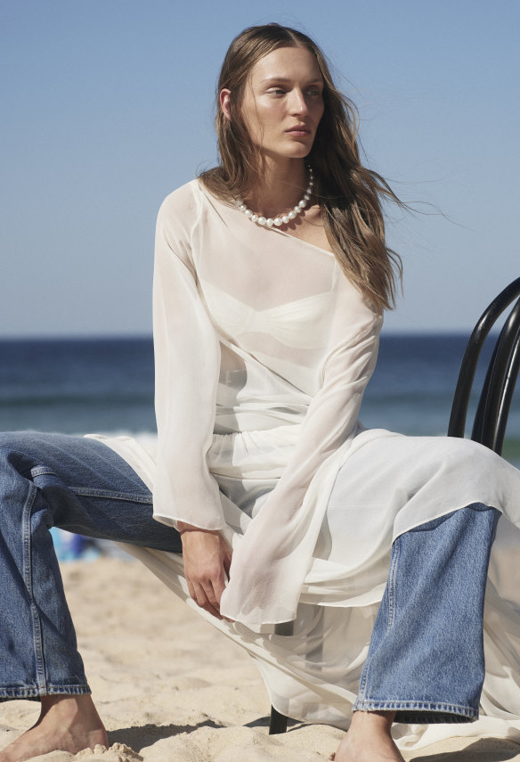 Beare Park “Joyce” dress, $820. Venroy “Balconette” bikini top, $140. Model’s own jeans.
