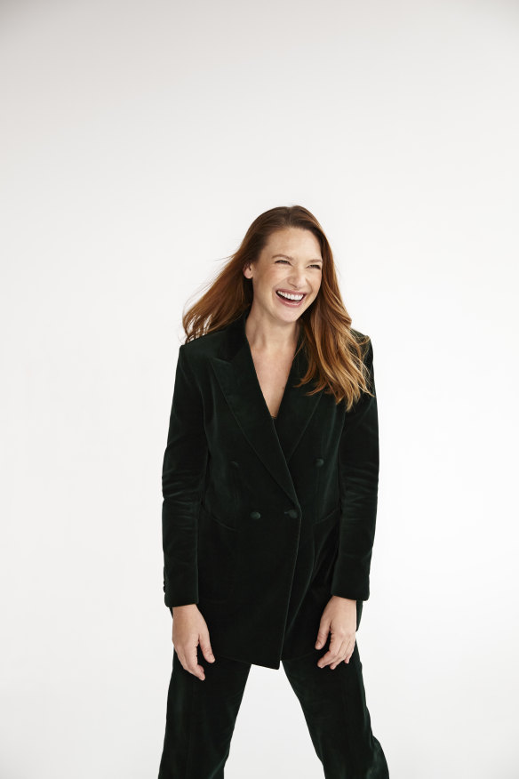 Anna wears an E Nolan velvet suit.