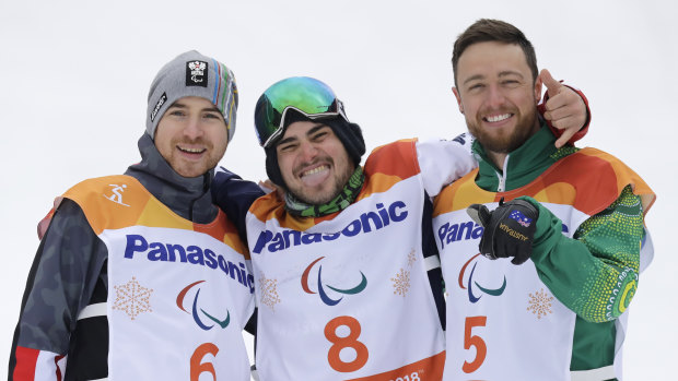 Simon Patmore, right celebrates with gold medalist Mike Minor of the United States, center, and silver medal winner Patrick Mayrhofer of Austria.