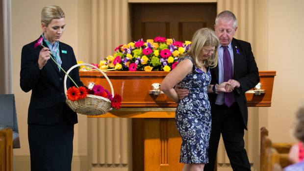 Matthew Leveson's parents, Mark and Faye, at his funeral on Friday.