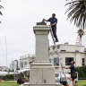 Queen Victoria monument doused in paint after vandals hack off Captain Cook statue