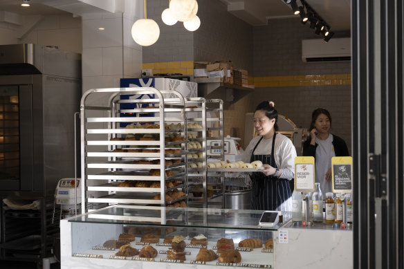 A new batch of croissants arrives on the cooling racks at Crescent Croissanterie.