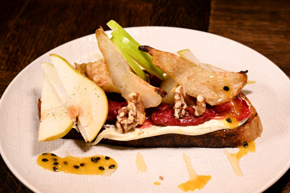 Fruit bruschetta with apple slices, baked pear, honey, mascarpone, fresh walnuts and stewed rhubarb.