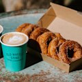 Old Wheels Grind serves coffee and doughnuts from the back of a ute.