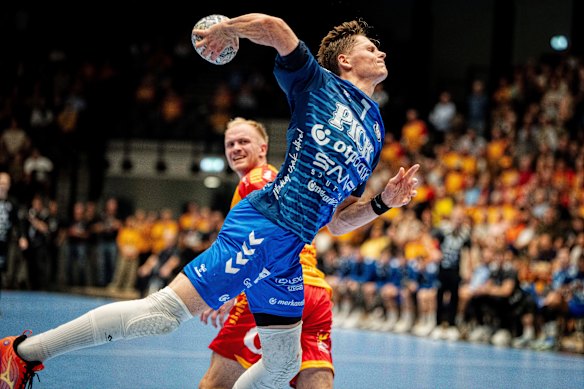 Hungary’s Peter Lukacs throws the ball during the EHF Champions League group handball match against Denmark in Svendborg, Denmark.