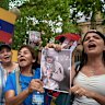 Supporters of the Venezuelan opposition celebrate following the fall of President Nicolás Maduro in Sydney on Sunday.