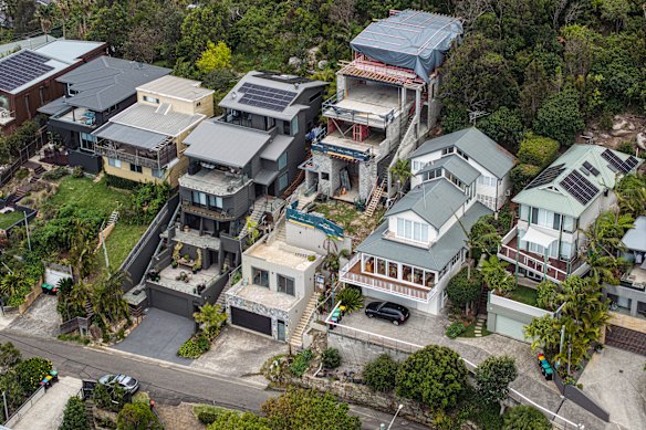 An aerial view of the Newport home at the centre of controversy over unauthorised works. Home in question is third from the right.