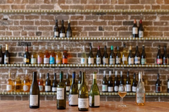 Customers can choose a bottle from the shelf to drink in-store for $15 corkage.