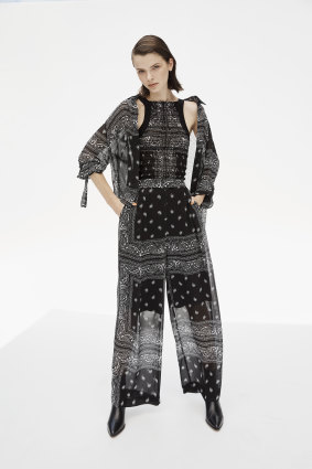 Dion Lee “Bandana” shirt, $490; “Bandana Shirred” tank, $390; “Bandana Scarf” trousers, $690. Sandro Paris boots, $650.