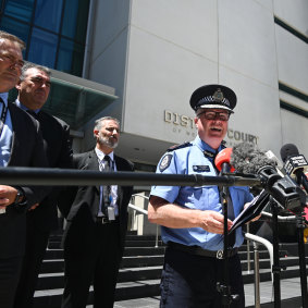 WA Police Commissioner Chris Dawson, flanked by Macro detectives, addresses the media following the sentencing of Bradley Edwards.