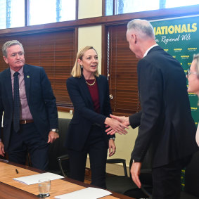 WA Nationals leader Mia Davies and Liberal leader David Honey shake on their alliance agreement