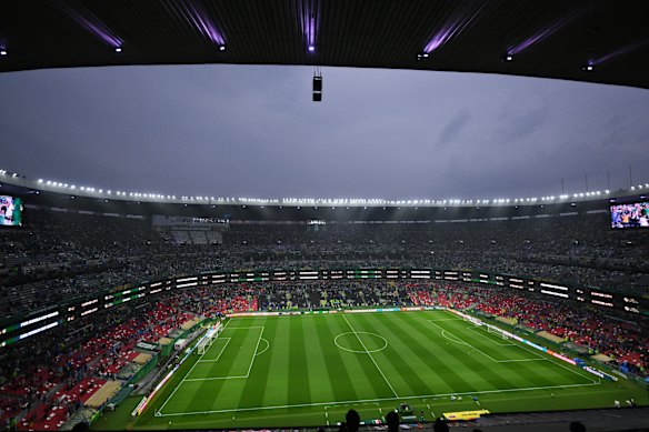 General view inside the stadium as rain falls in Mexico City.