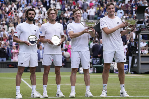 The Australian pair (left) with their runners-up plates and the champions (right).