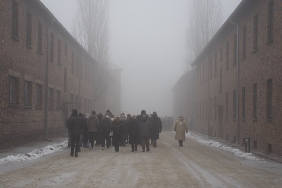 People visit the Memorial and Museum Auschwitz-Birkenau, a former Nazi German concentration and extermination camp, in Oswiecim, Poland.