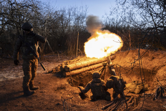 Ukrainian servicemen fire a mortar towards Russian positions at the frontline near Bakhmut, Donetsk region, Ukraine last month.