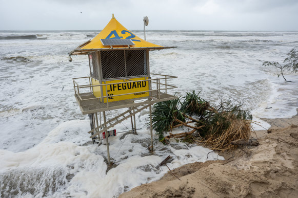 A lifeguard post and collapsed tree on the eroded Southport Spit on the Gold Coast on March 7.