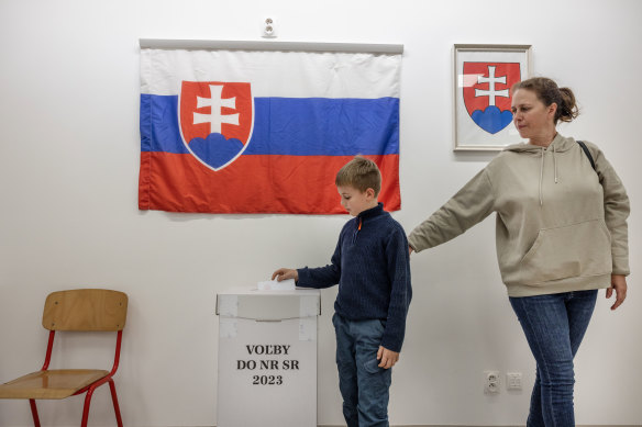 Voters cast their ballots at a polling station in Slovak parliamentary elections in Bratislava, Slovakia.