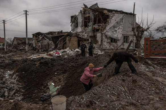 Russian strikes left a crater in the township of Hlevakha outside of Kyiv on Thursday.