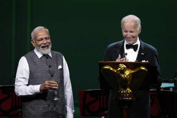 Narendra Modi and Joe Biden enjoy a joke during the state dinner at the White House.