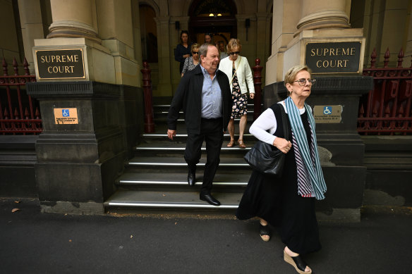 Family and supporters of Adam Brown leave the Supreme Court on Friday.