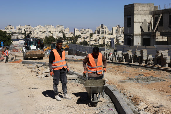Palestinian labourers work at a construction site in the Israeli settlement of Maale Adumim, in the occupied West Bank last month. 