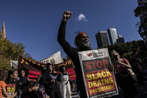Demonstrators in Sydney on Saturday call for an end to black deaths in custody.