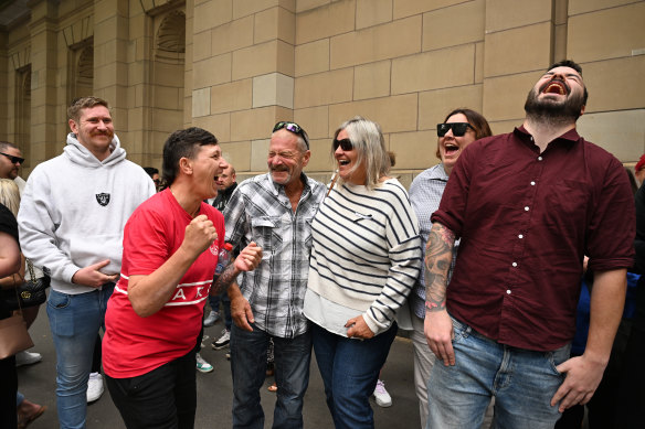 The Bond family celebrate outside court.