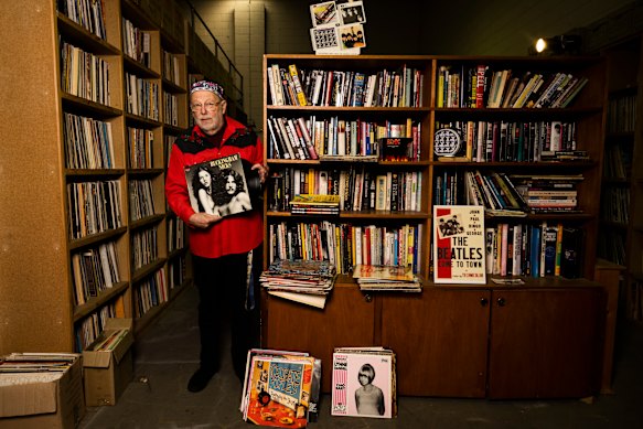 Glenn A. Baker among his 50,000 records in the Penrith warehouse in 2024.