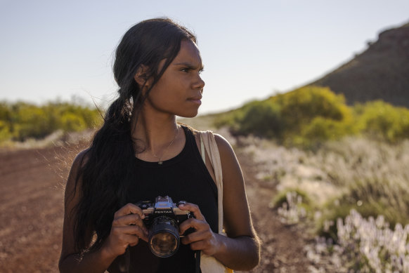 Shantae Barnes-Cowan plays Murra, who falls in love with the camera on trip to the outback, in Sweet As.