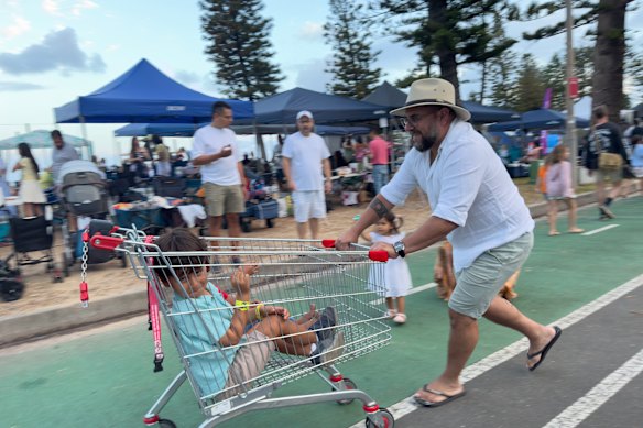 Families at Dee Why Beach having fun on New Year’s Eve.