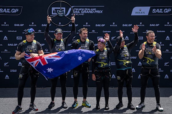 The Australian team celebrate their victory in Auckland.
