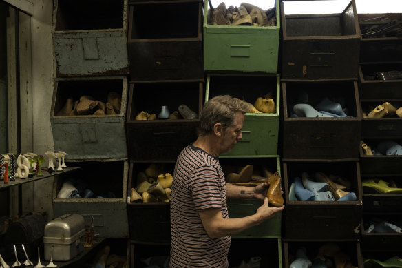 Bischoff with his collection of shoe lasts, which he says have become harder to source.