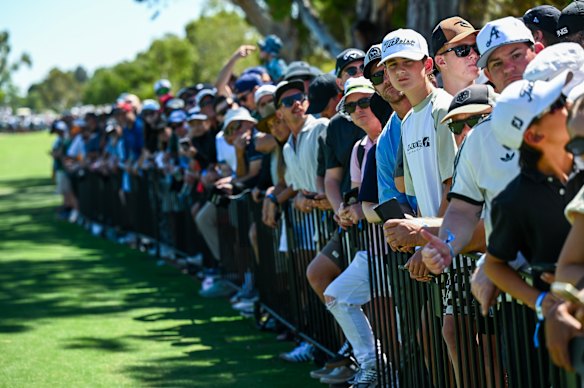 Fans line the fairways on Friday at The Grange Golf Club, where this year’s LIV Adelaide tournament is being played.