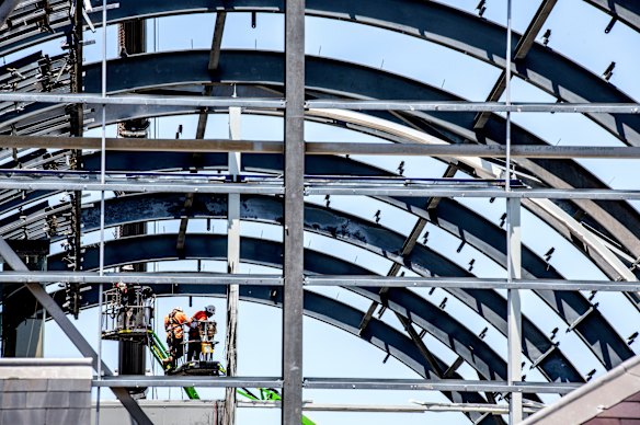 The steel ribs are exposed as the Wran Building is demolished.