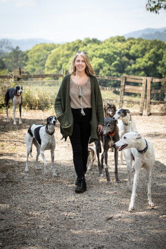 Lisa White with her greyhounds at her home in Murwillumbah, northern NSW. 
