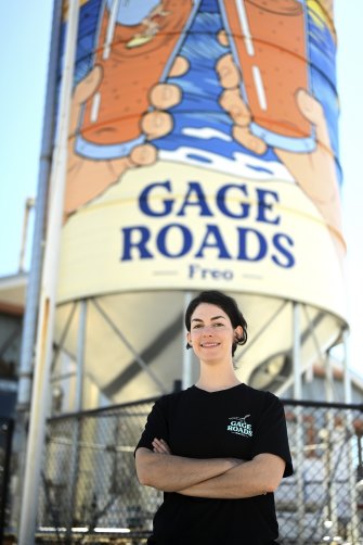 Gage Roads Freo head brewer Simone Clements stands in front of the venue’s grain silo.