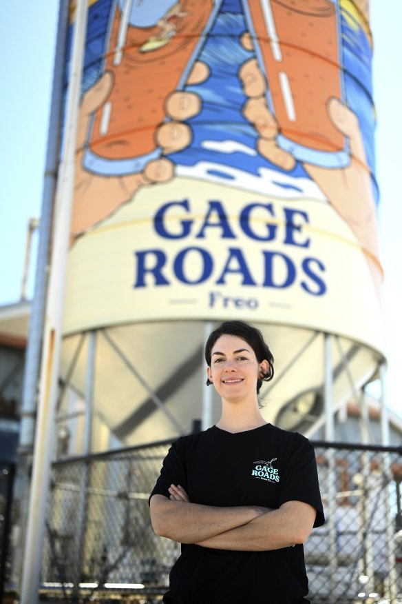 Gage Roads Freo head brewer Simone Clements stands in front of the venue’s grain silo.