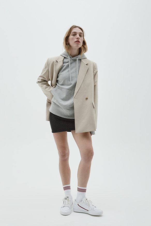 Blanca “Lawrence” blazer, $380. Zara hoodie $109. Sandro dress, $720. Najo gold earrings, $129 (worn throughout). Adidas Originals “Continental 80″ sneakers, $160, from The Iconic. Stylist’s own socks.