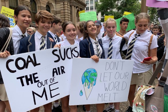 Charlotte, 13 (third from left), and Annie, 14, (fourth from left) in Sydney.