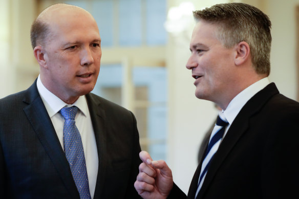 Peter Dutton and Mathias Cormann in December 2017.