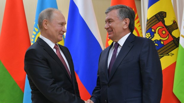 Russian President Vladimir Putin, left, and Uzbekistan's President Shavkat Mirziyoyev in Moscow in December.
